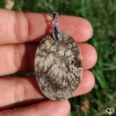 Agate feather pendant in Indonesia