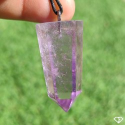Pendant with polished amethyst tip